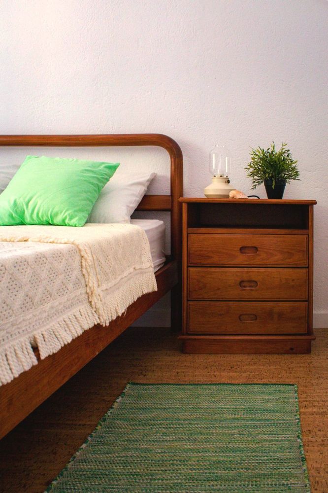 A bedroom, linen and wood