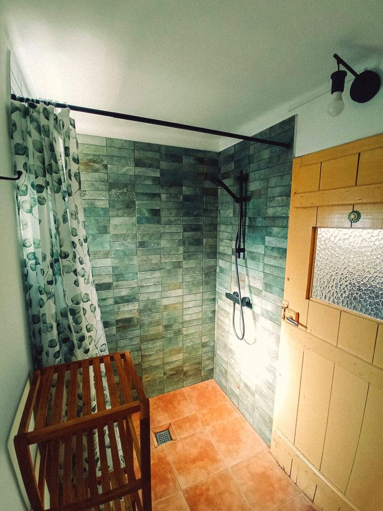 The green-tile shower