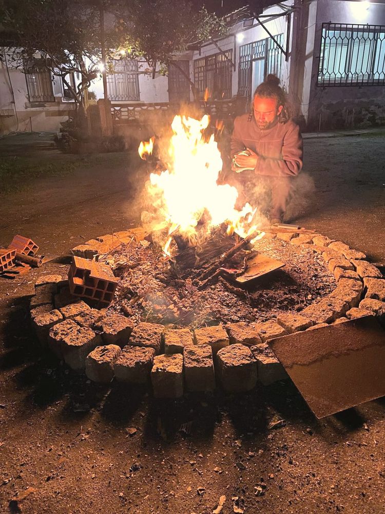 The fire pit lit